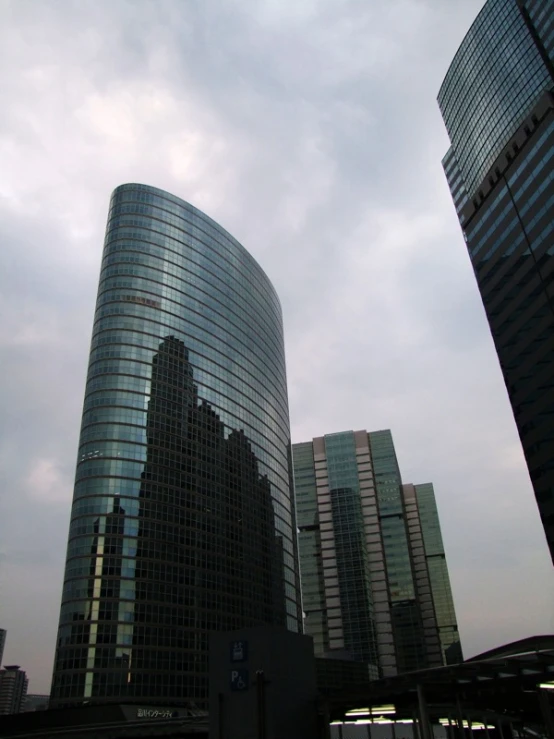 a large group of tall buildings standing next to each other