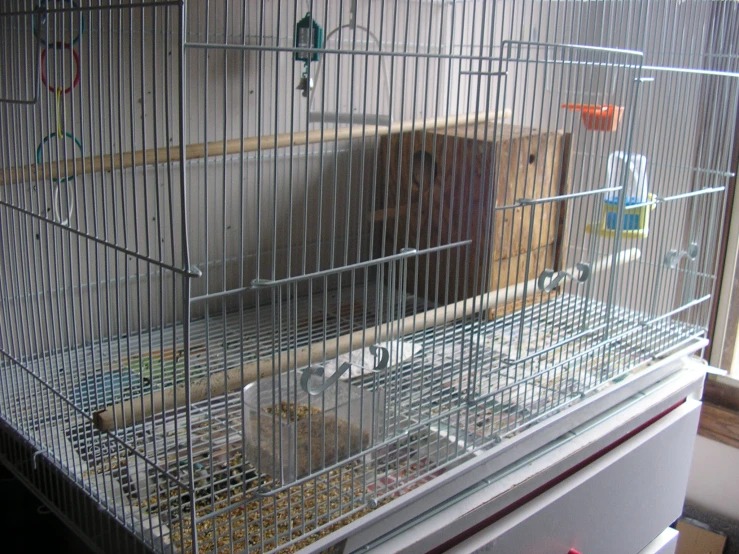 a small cage that has two cages inside