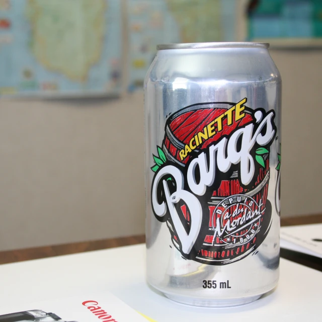 a bottle of beverage on a table in a room