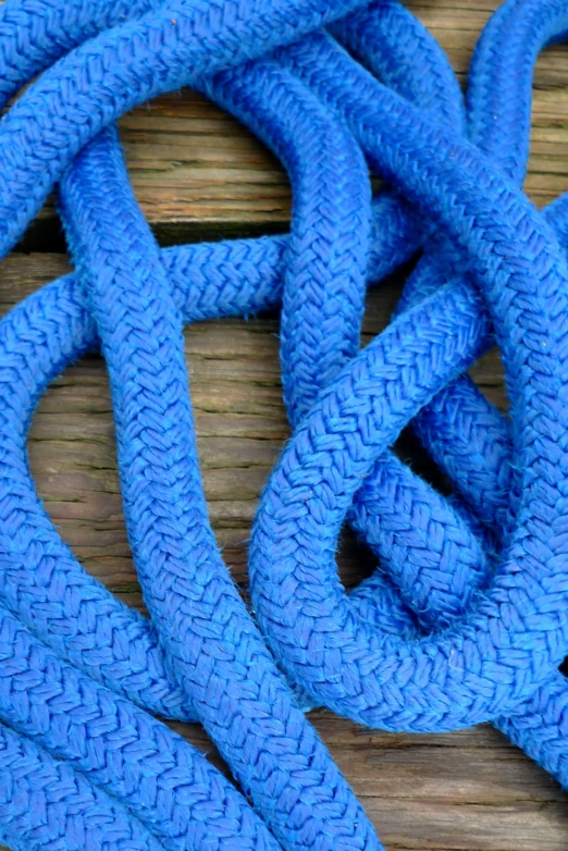 blue ropes on a wood surface