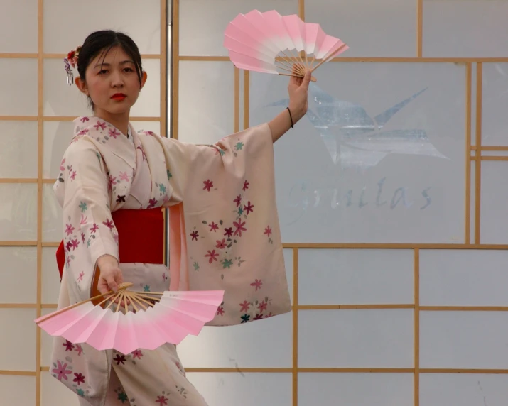 asian girl dressed up with japanese geisha parasol