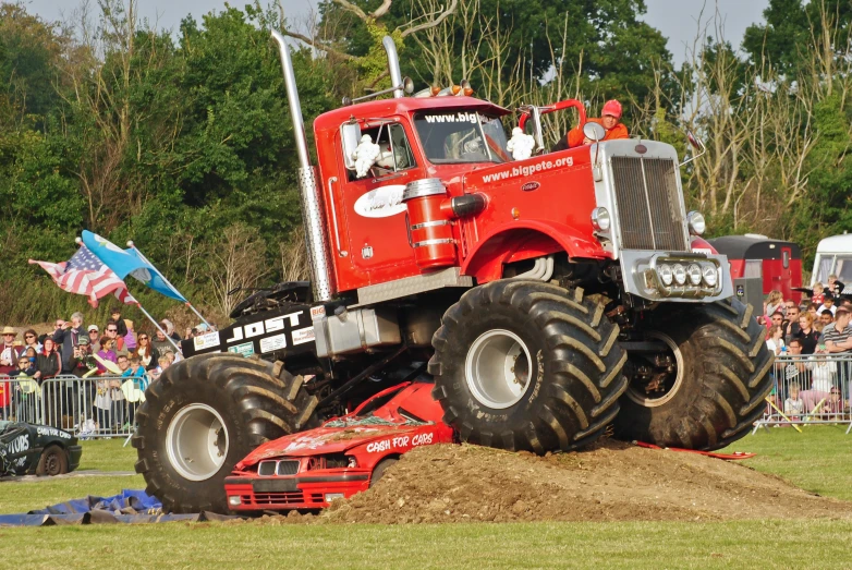 there is a red truck with a massive huge engine