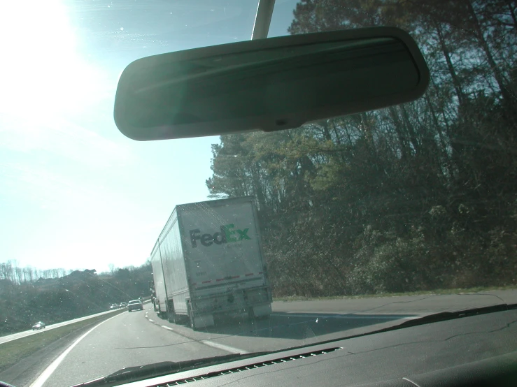 a truck is traveling down the highway