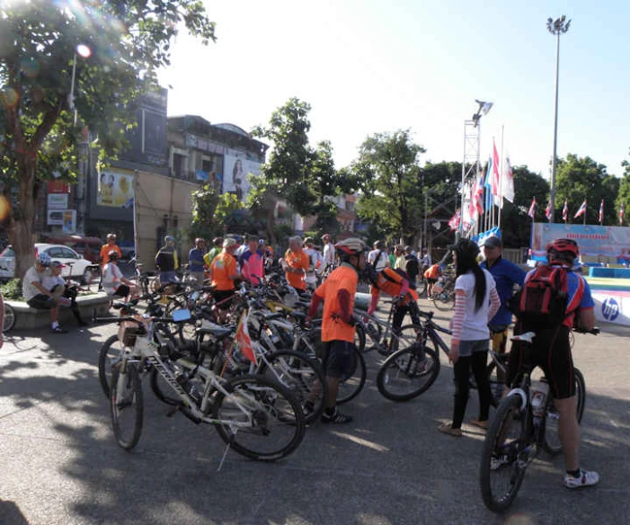 the bike riders are lined up on the street