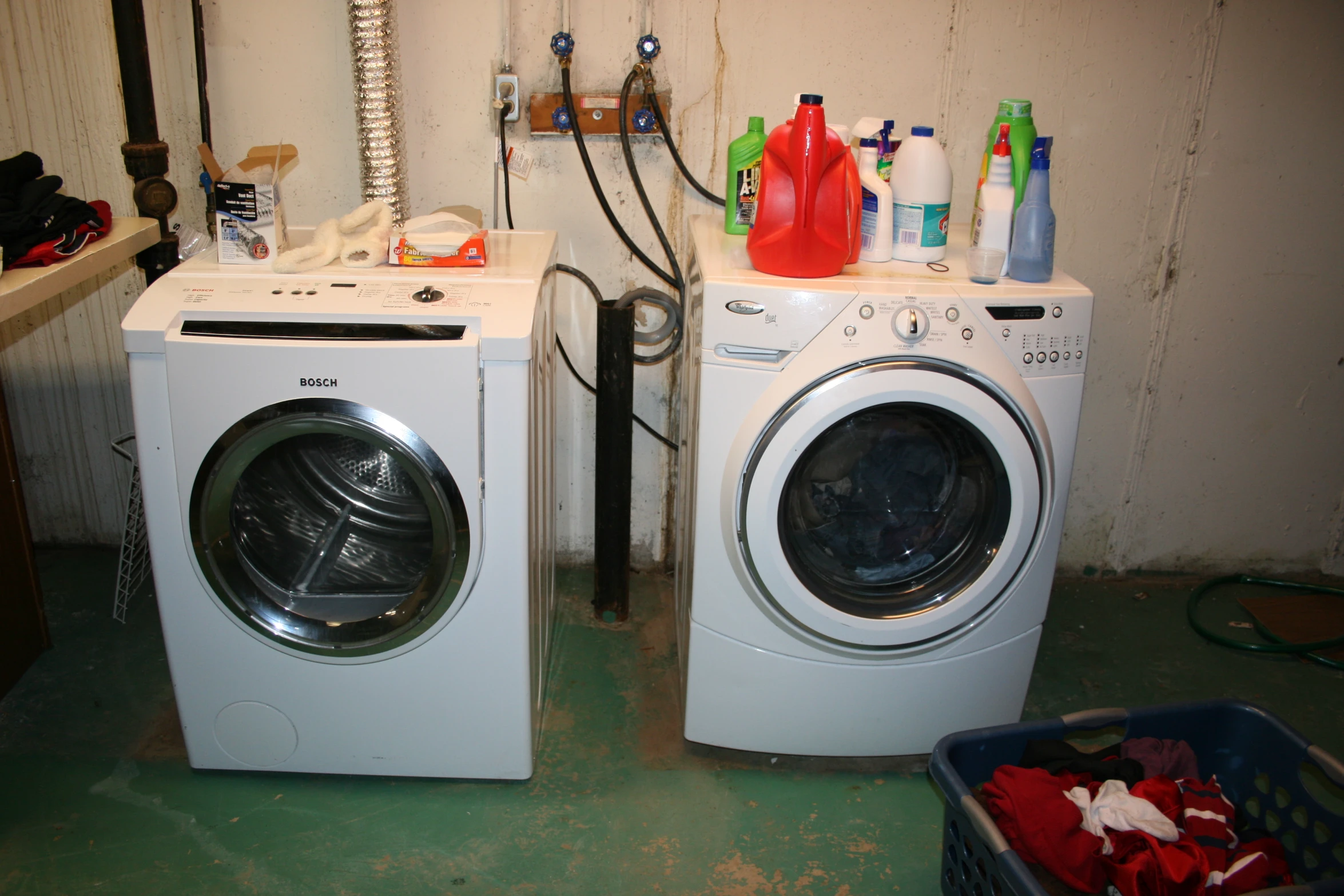 a pair of washing machines in front of the washing machine