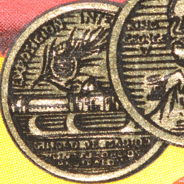 an image of two gold coins in black and gold