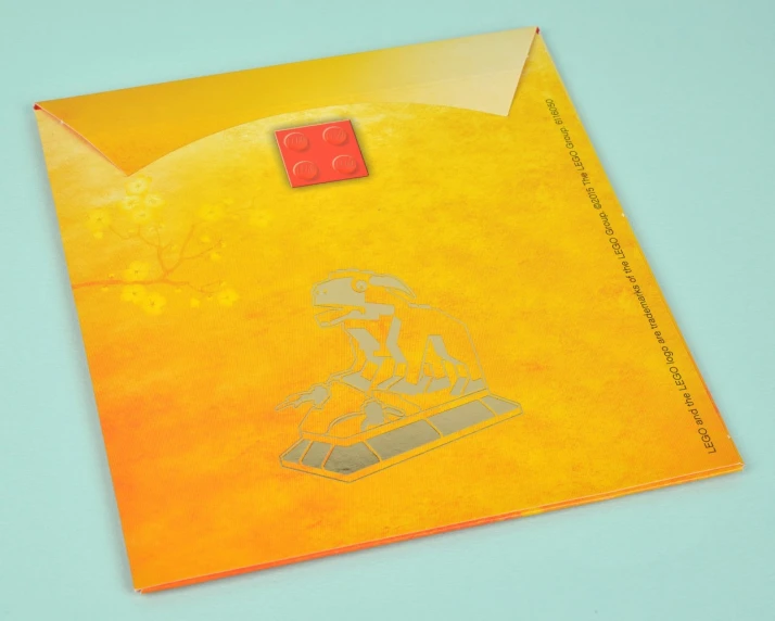 an envelope that is open on a blue surface