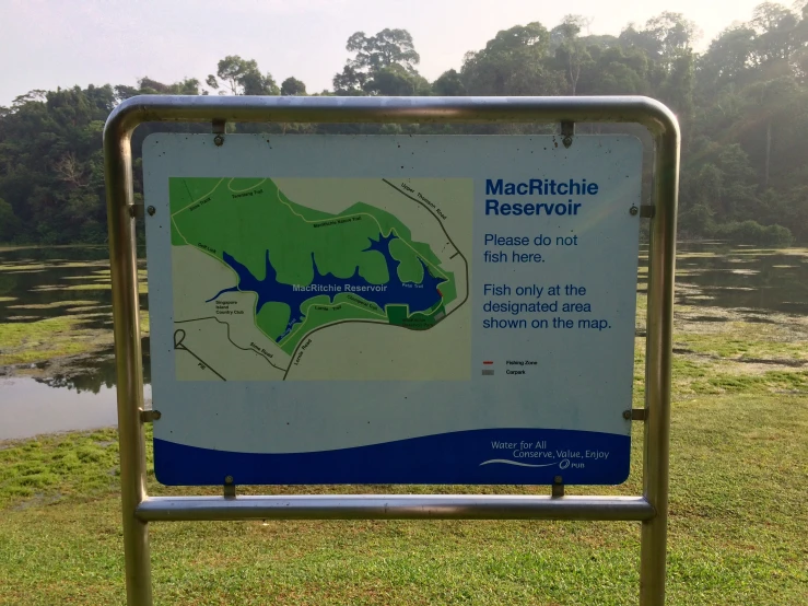 sign indicating how the fish can be seen on a pond