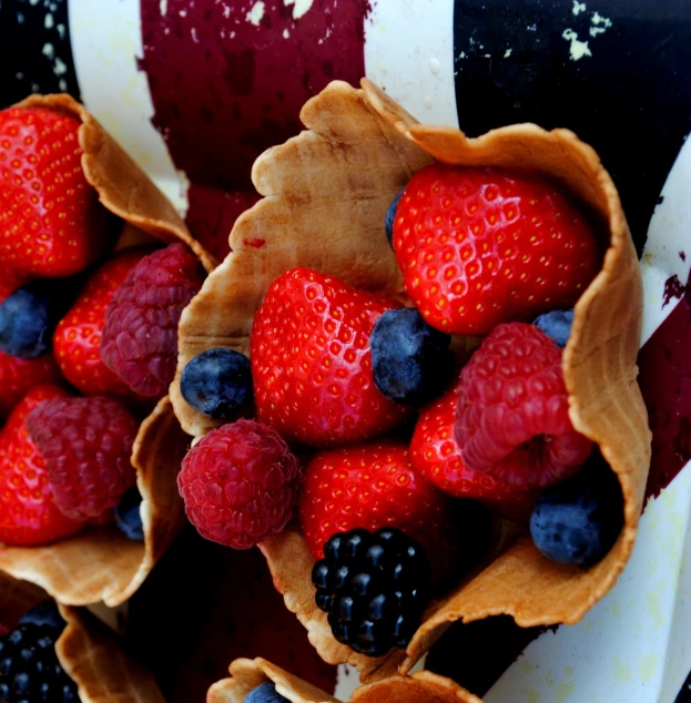 a close up of some fruit in a bowl