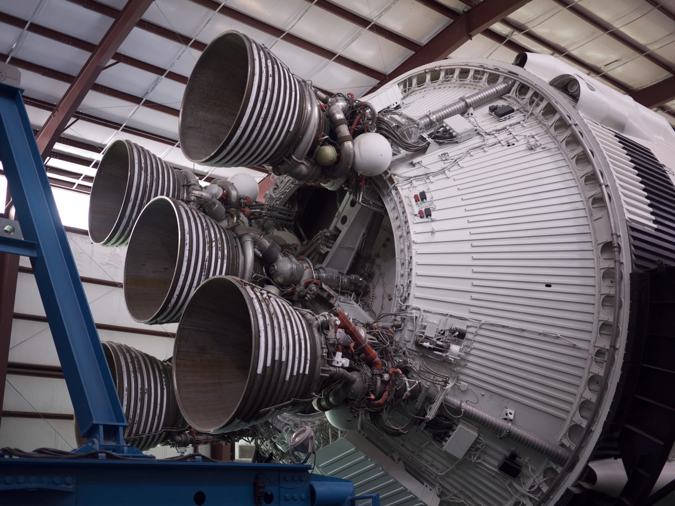 a large jet engine sitting inside of a garage