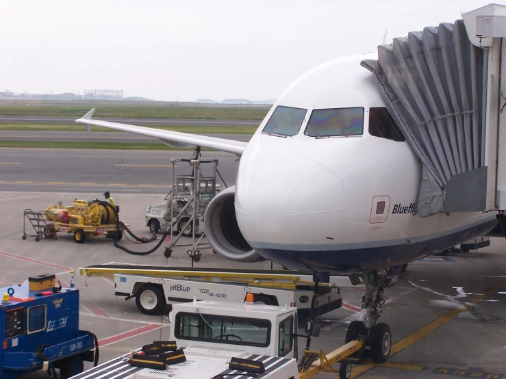 an airplane is being moved to the runway