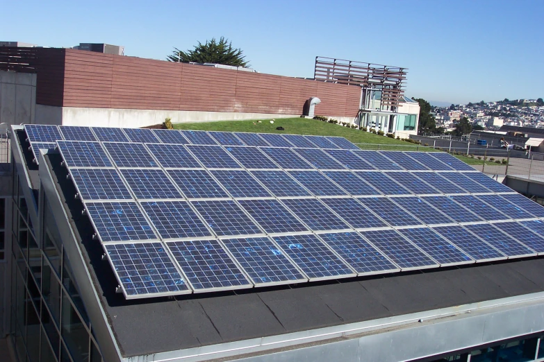 there is a rooftop view of several rooftops and buildings