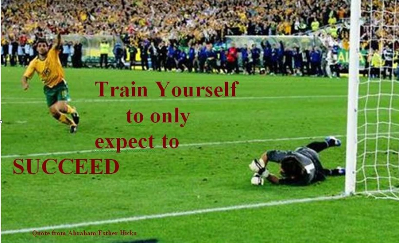 an image of a man falling in to the grass with words saying train yourself to only expect to success