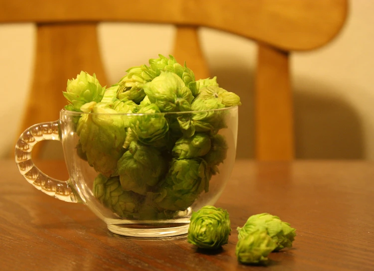 a cup that has some buds inside of it