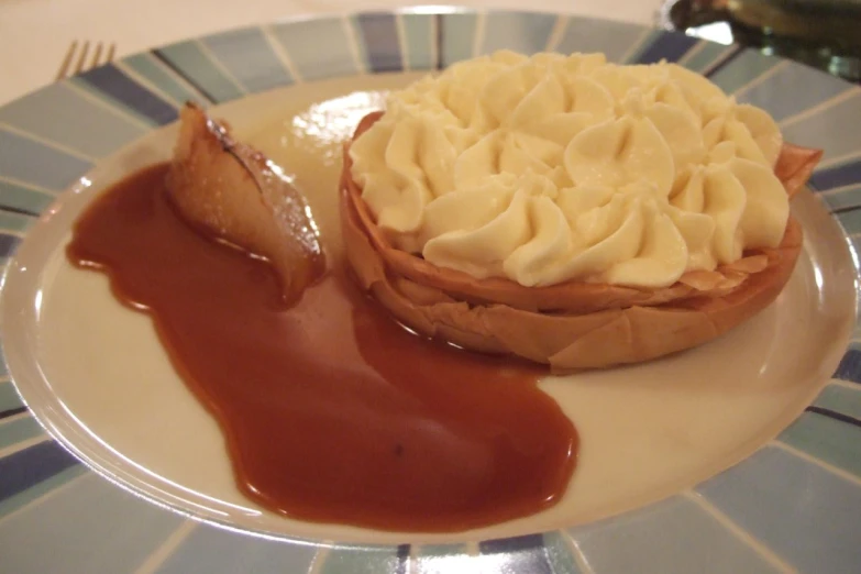 a plate with a small dessert on it