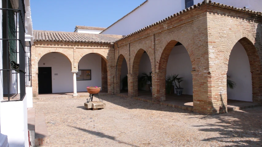 an outdoor courtyard is shown with a fire hydrant