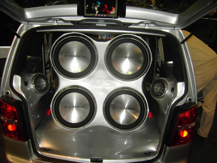 the inside of an electric vehicle with speakers