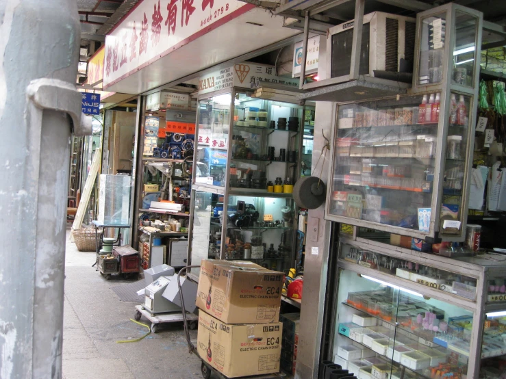 a storefront with many boxes and shelves of products