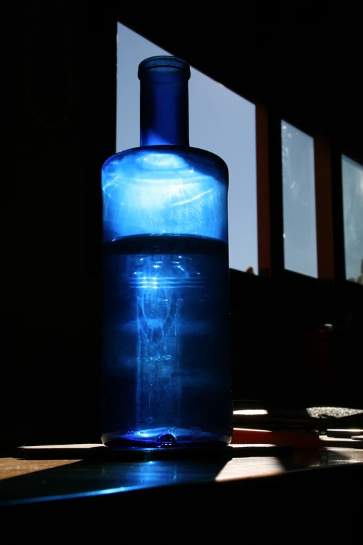 a bottle of water sitting on top of a table