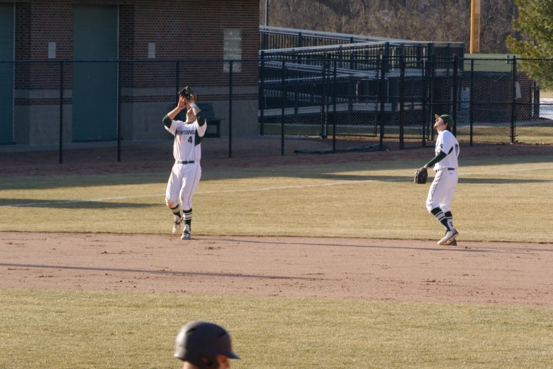 there are two people that are playing in a baseball game