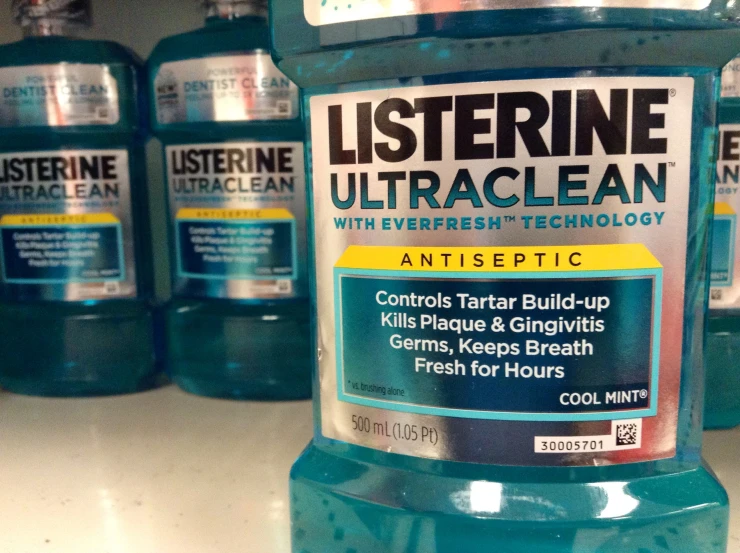bottles of listerine ultraclean antiseptic on a shelf