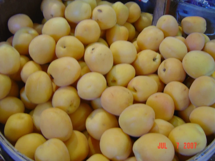 some fresh fruit that is being sold in a bowl