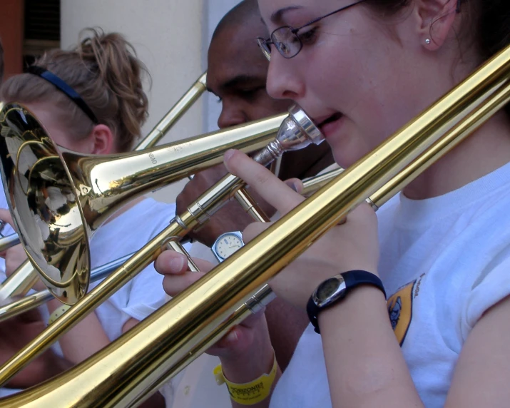 a man and a woman playing trombones