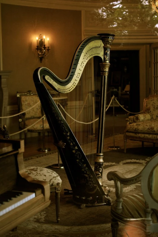 a harp leaning against a wall in a el lobby