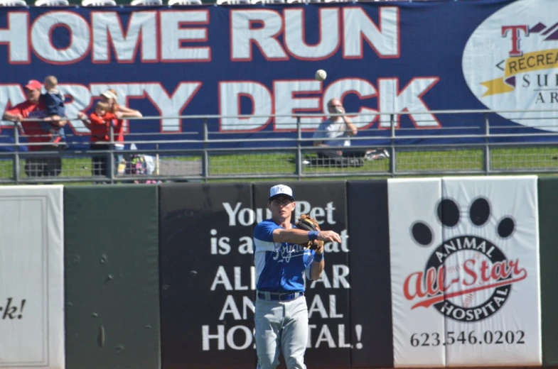 the baseball player catches the ball and runs