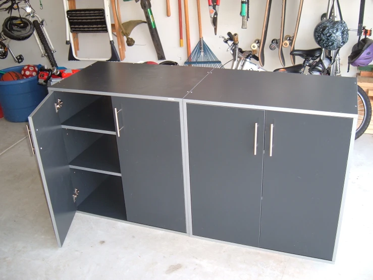 this is a garage with multiple grey cabinets
