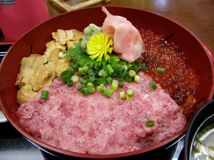 a bowl with several different types of food in it