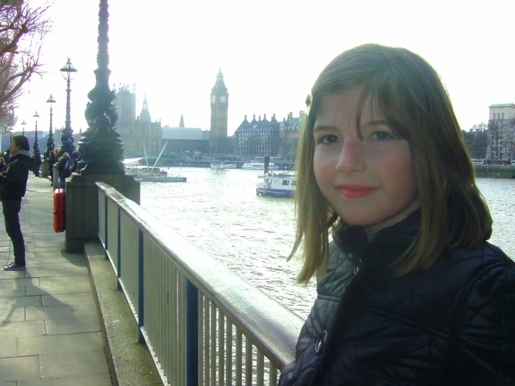 a  standing by the water in london