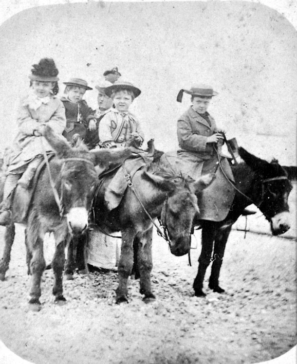 a group of people sitting on horses