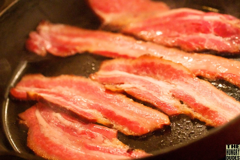 bacon is cooking in a set being cooked