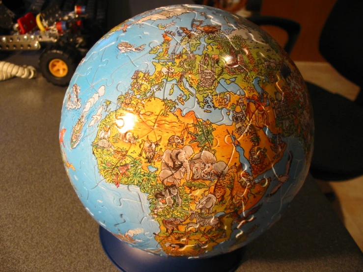 an earth globe covered in the most important landmarks