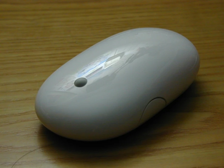a computer mouse is sitting on the table