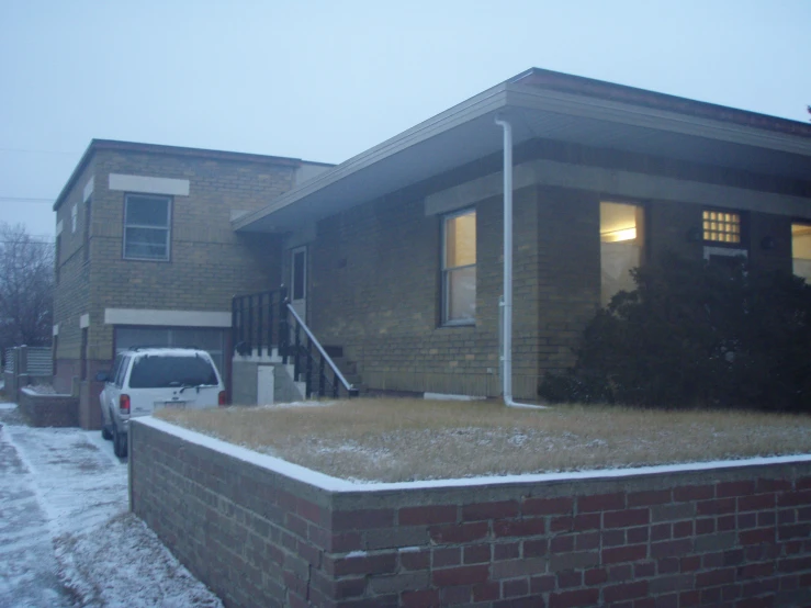 a house is shown during the cold winter months