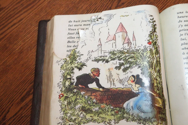 a children's book is opened and showing the pages