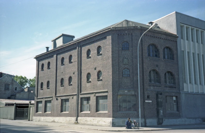 an old brick building in a small town