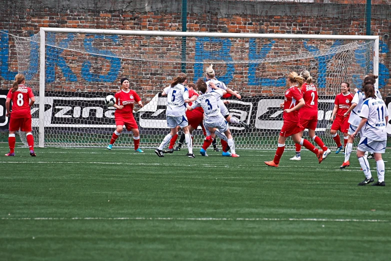 several players in red are on a field