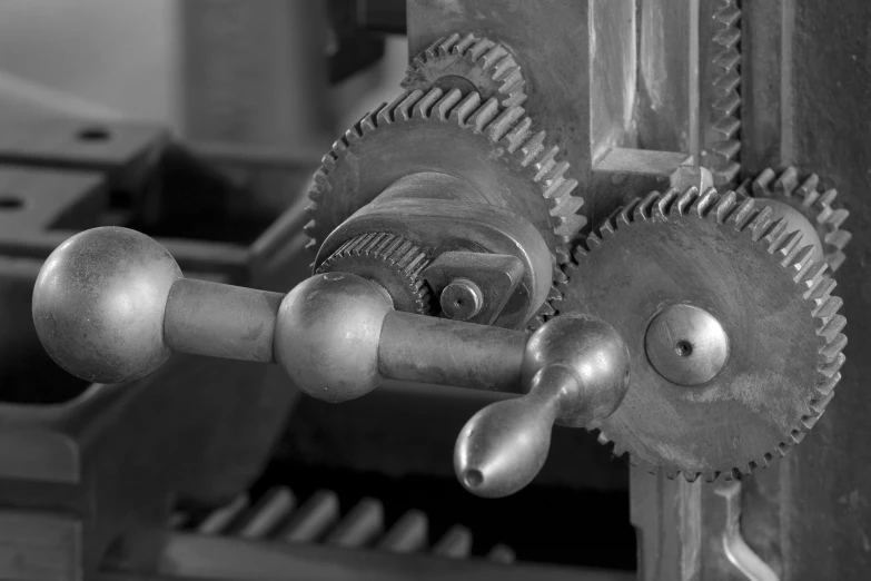 the gear on a milling machine is black and white