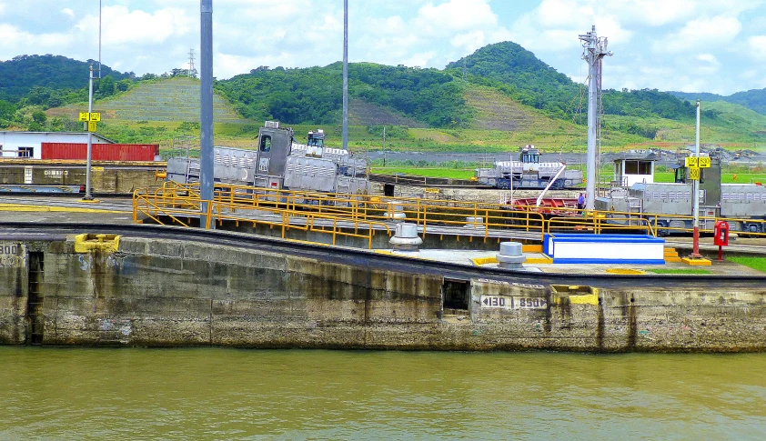 a cargo boat dock at a large cargo port