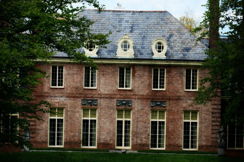 a large red brick building with many windows