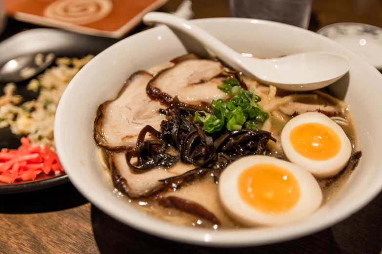 a bowl that has various types of food in it