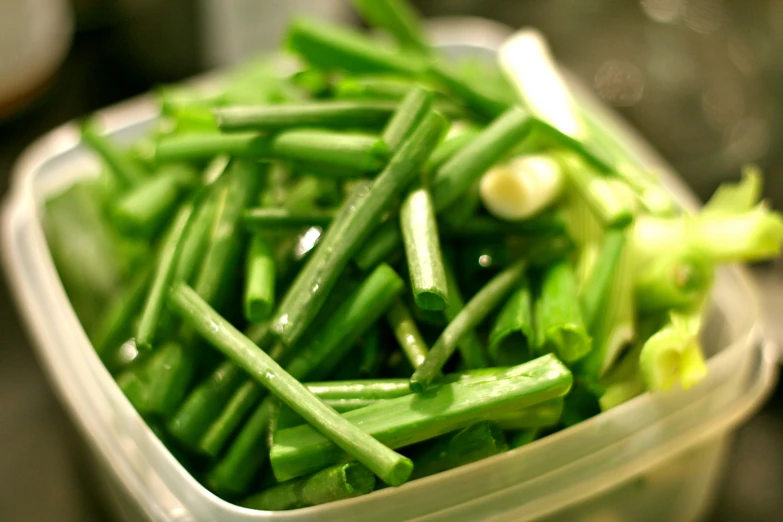 closeup of green beans in a container