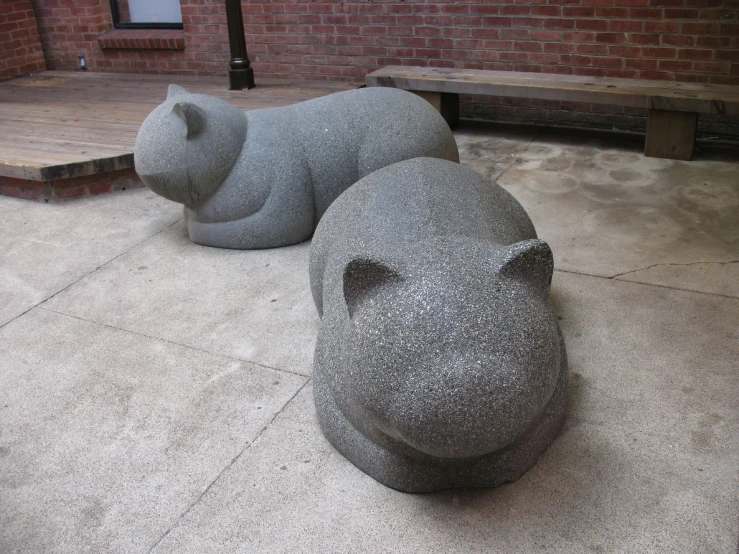 a statue of a hippo on a street