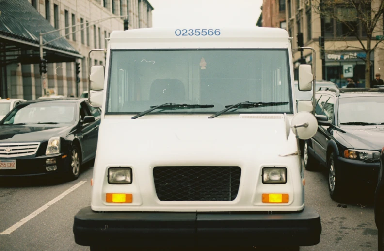 a white truck that is parked in the street