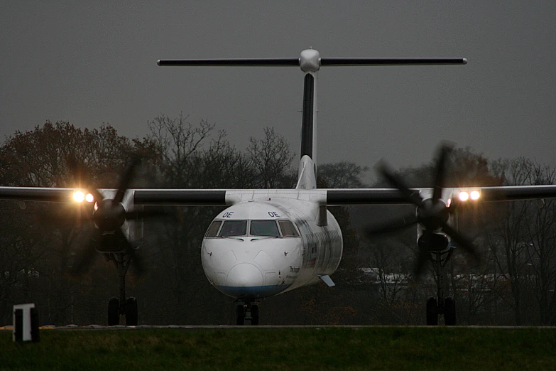 a large commercial airplane takes off at night