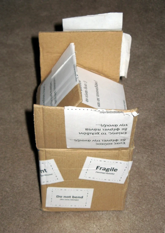 a pile of boxes with labels on the inside