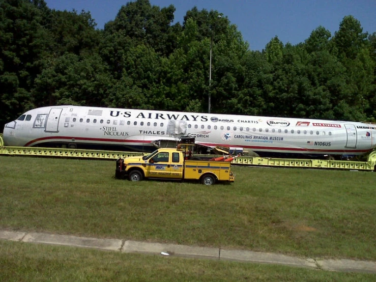 a large air plane on top of a runway